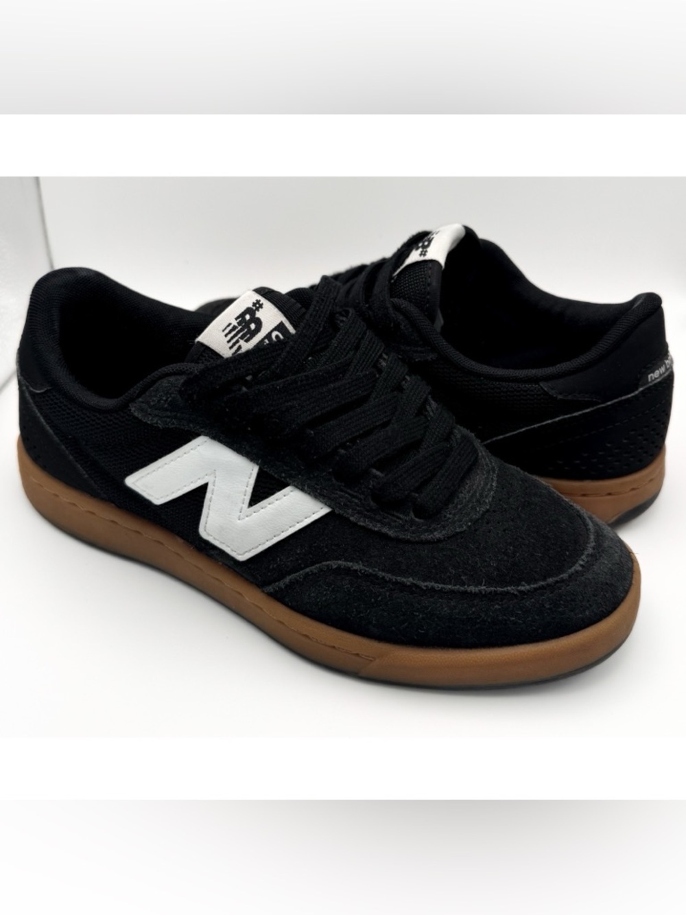 New Balance Men's Black Sneakers with White Logo and Gum Sole